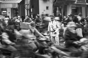 Vietnamese police looking desperate in chaotic traffic in Hanoi.